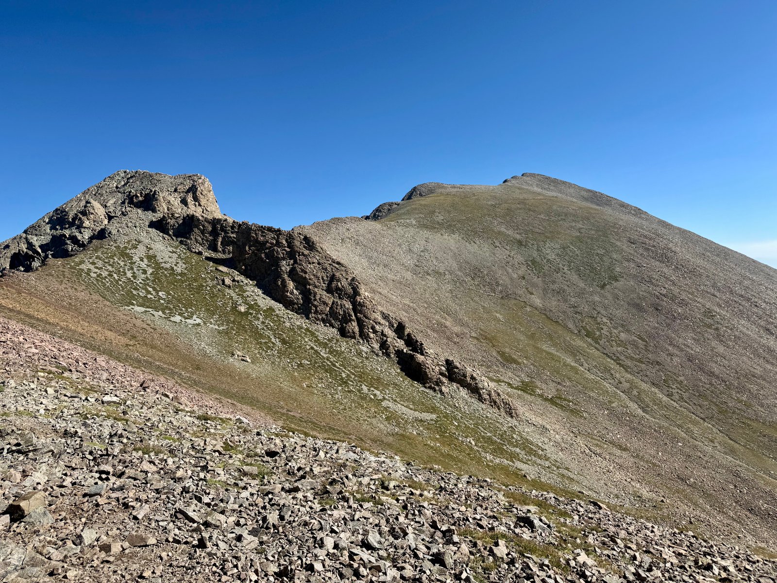 Huerfano Peak and Iron Nipple from saddle